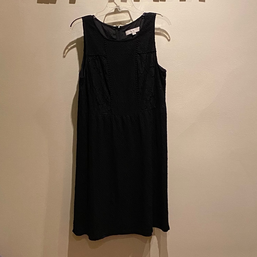 Black, sleeveless Loft dress with lace overlay